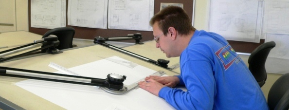 Student working at drafting table